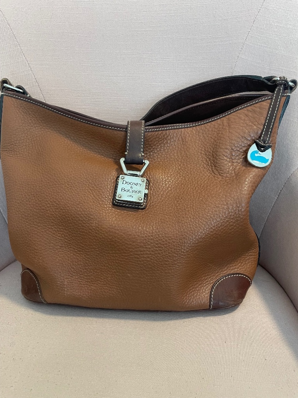 Dooney & Bourke Pebble Grain Leather - Turquoise Duck Charm